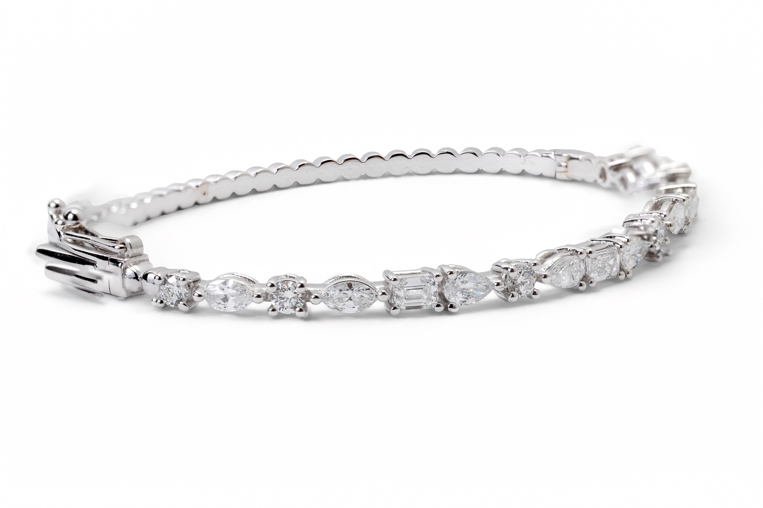 Multi Shaped Diamond Bracelet In 18K White Gold
